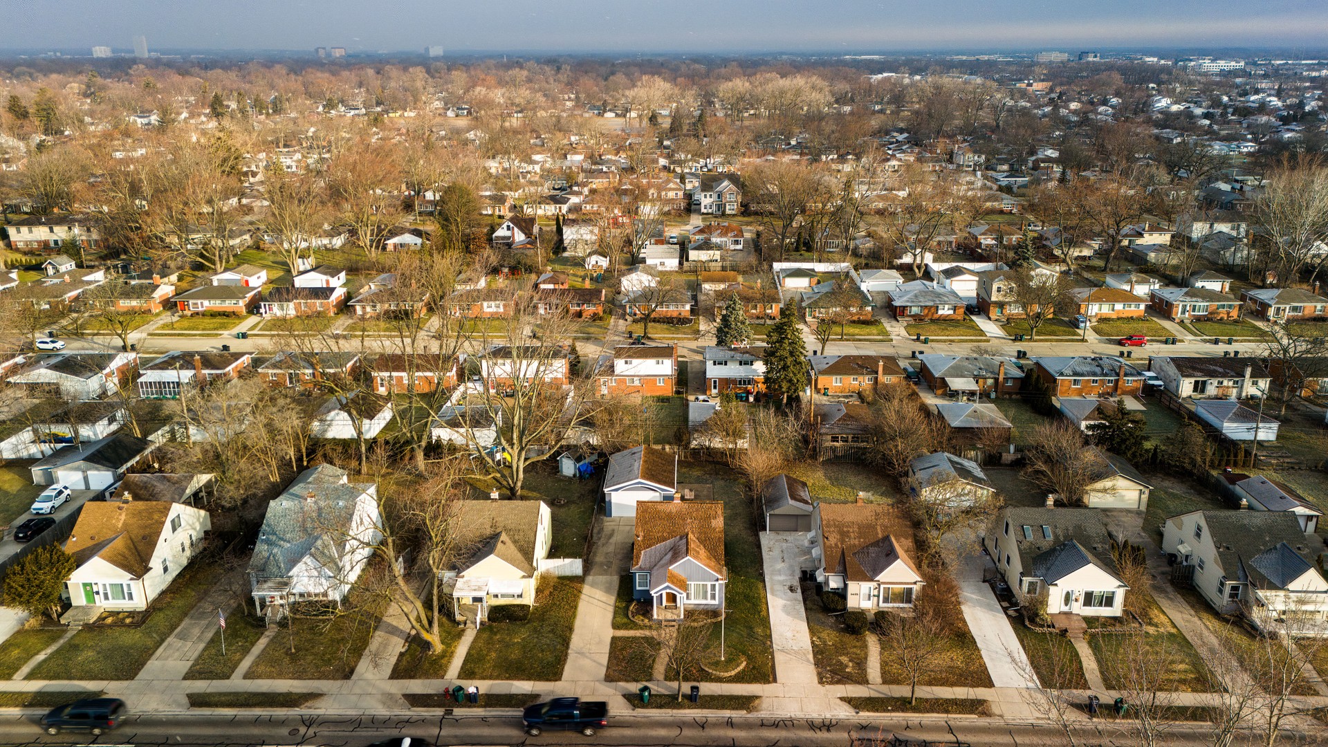 Springtime in Royal Oak, MI. Houses in a row line the main street of Royal Oak neighborhood in Michigan