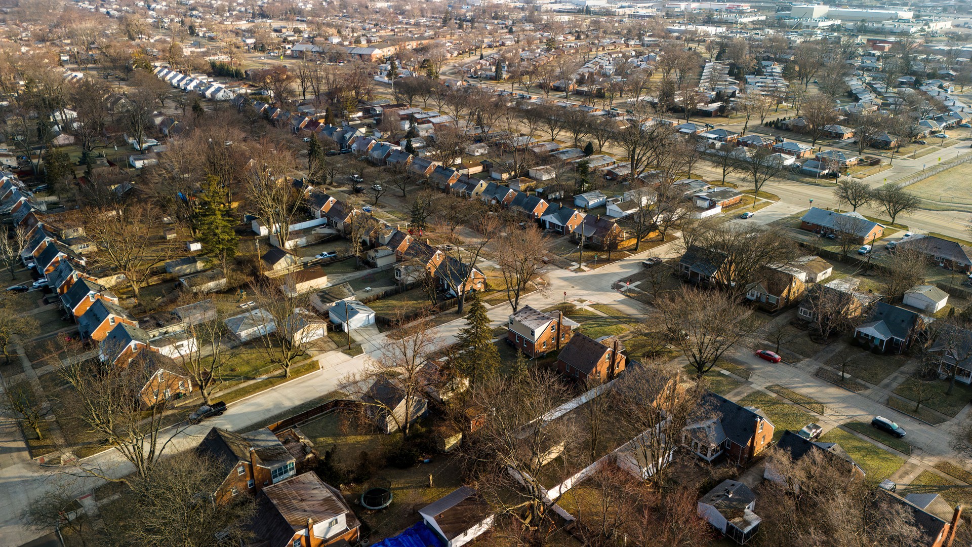 Royal Oak neighborhood in spring Michigan: small detached houses stretching along the suburban of Detroit
